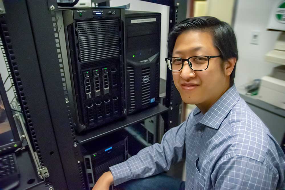 IT Director John Lin by Servers